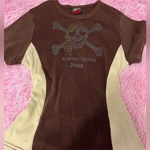 Brown skull shirt with the words “Austin Texas 2008” size large.